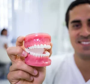 AnyConv.com__portrait-dentist-holding-set-dentures